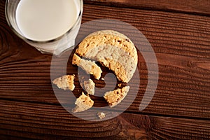 Cookies and milk. Chocolate chip cookies and a glass of milk. Vintage look. Tasty cookies and glass of milk