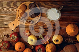 Cookies with milk on the table.