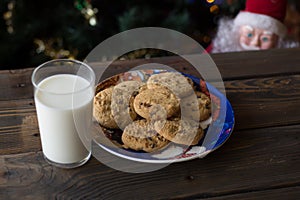 Cookies, milk and unfocussed Father Christmas