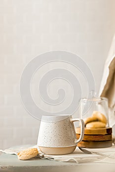 cookies and morning drink, coffee, milk or tea in light natural envoronment, kinfolk style breakfast