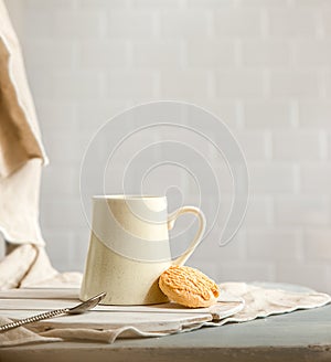 cookies and morning drink, coffee, milk or tea in light natural envoronment, kinfolk style breakfast