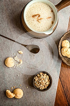 cookies and morning drink, coffee, milk or tea in light natural envoronment, kinfolk style breakfast