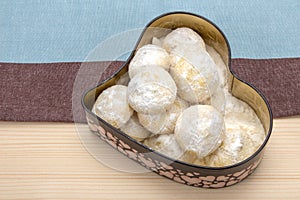 Cookies in powdered sugar in a box photo