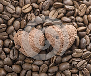 Cookies in shape of heart on coffee beans