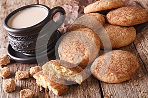 Cookies Snickerdoodle and coffee with milk close-up on the table