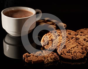 Cookies with steaming coffee snack photo