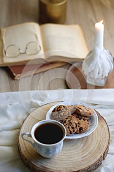 Cookies, Tea, Book, Candle and Flowers