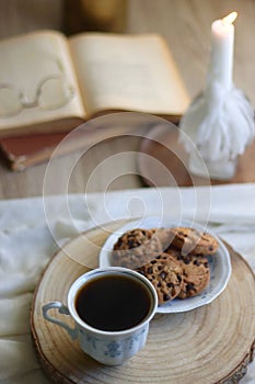 Cookies, Tea, Book, Candle and Flowers