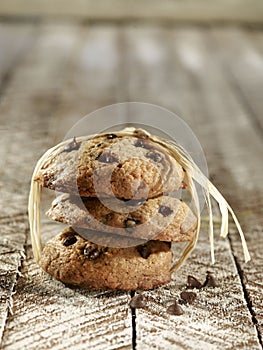 Cookies tied up, on wooden background