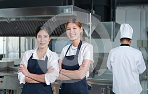 Cooking apprentices prepare meals and ingredients before the chef arrives to instruct