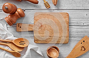 Cooking background: cutting board and kitchen utensils
