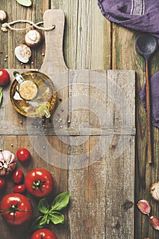 Cooking background with fresh italian ingredients flat lay copy space
