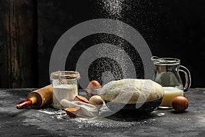 Cooking and baking ingredients utensils on dark background. Lactose and gluten free. place for text