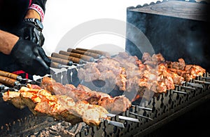 Cooking Barbecue on a gratar on a white background