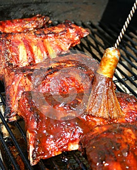 Cooking barbecue pork ribs on a grill