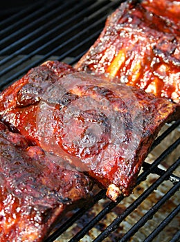 Cooking barbecue pork ribs on a grill