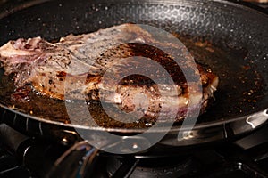 Cooking Beef Steak in Frying Pan