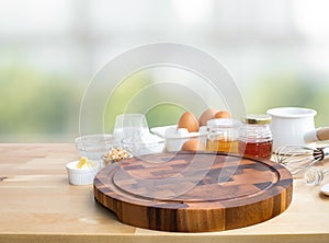 Cooking breakfast food or bakery with ingredient and copy space of chopping board in kitchen background