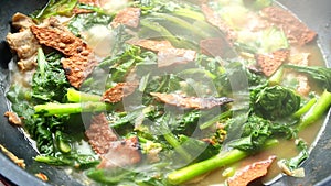 Cooking Cantonese vegetables soup or Jor Pak Kard