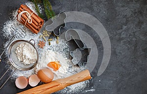 Cooking Christmas baking. Ingredients for the dough and the spices on the table. Flour, eggs, Cinnamon sticks, cardamom, star