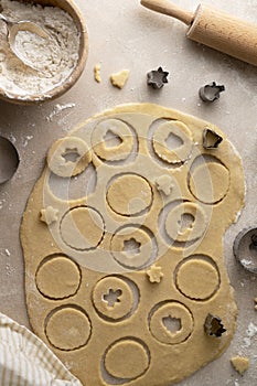 Cooking Christmas cookies. Raw dough, cookies cutters, rolling pin. Step by step recipe