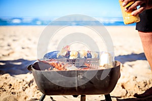 Cooking crayfish on the beach