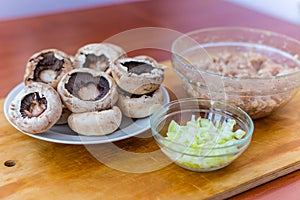 Cooking dishes from mushrooms champignons with meat