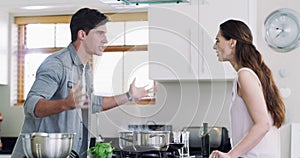 Cooking, divorce and a couple in the kitchen of their home, arguing about food, ingredients or the recipe. Stress
