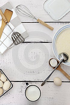 Cooking dough for pancakes. Rustic style, vintage utensils for the kitchen