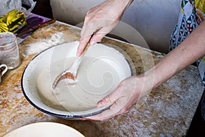 Cooking dough for a pie in the kitchen