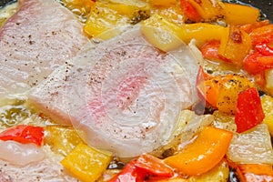 Cooking Fish and peppers