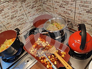 Cooking food - fried vegetables and soup