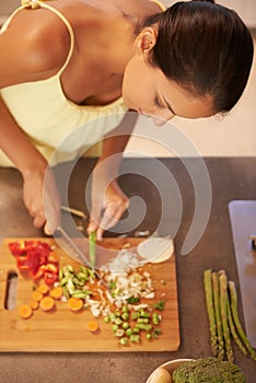 Cooking, food and health with chef in kitchen of home to prepare meal for diet or nutrition from above. Woman