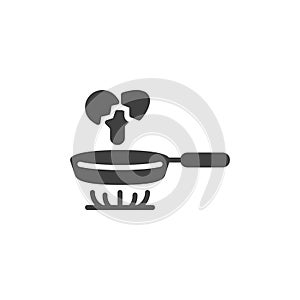Cooking fried eggs in pan on stove vector icon