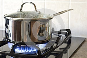 Cooking on a gas stove photo