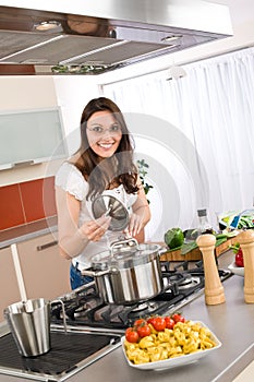 Cooking - Happy woman cook in modern kitchen