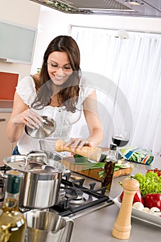 Cooking - Happy woman cook in modern kitchen