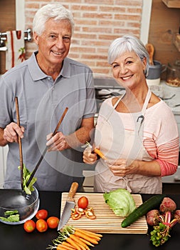 Cooking, health and smile with portrait of old couple in kitchen for salad, love and nutrition. Happy, help and