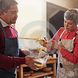 Cooking, home and mature couple in kitchen with meal prep for lunch, supper and dinner together. Marriage, love and man