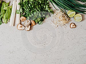 Cooking ingredients for Asian dishes on gray concrete background