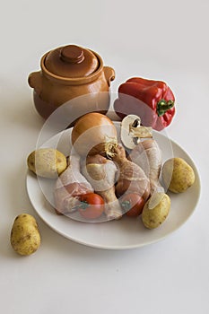 Cooking ingredients for meat in clay pot