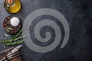 Cooking ingredients and utensils on stone table