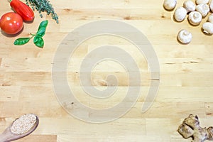 Cooking ingredients on wooden table. Background with empty space. H