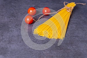 Cooking Italian pasta with tomatoes concept.