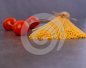 Cooking Italian pasta with tomatoes concept.