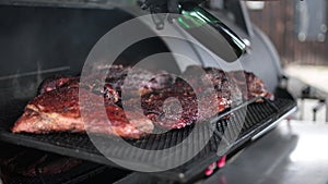 Cooking juicy meat steak pork beef slice in outdoor grill barbecue grid summer rustic picnic party