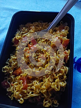 Cooking maggi noodles with love