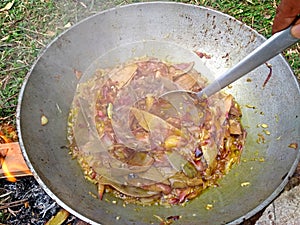 Cooking and making of tasty delicious meat gravy for chicken mutton beef pork in india using onion garlic chili ginger bay leaves