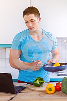 Cooking man vegetables recipe computer portrait format eating