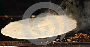 Cooking masala dosa at Surajkund Mela food stall